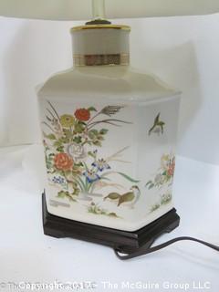 Ceramic table lamp with Asian motif; includes shade 