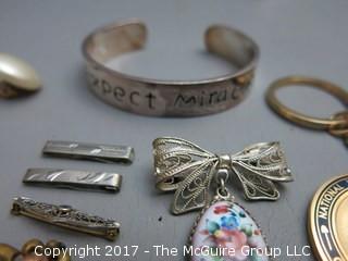 Collection of costume jewelry and sterling belt buckle 