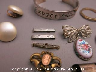 Collection of costume jewelry and sterling belt buckle 