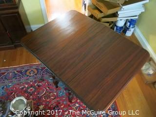 Gate-leg table: (folded: 15" x 36"; unfolded: 48" x 36"; 3 leaves, each 8") 