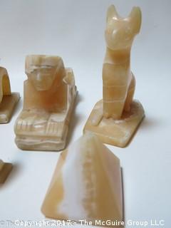 Collection of carved alabaster including pyramids  