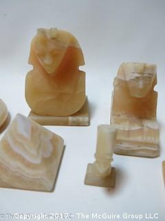 Collection of carved alabaster including pyramids  