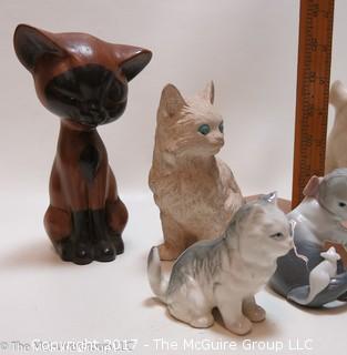 Collection of cat figurines in various media