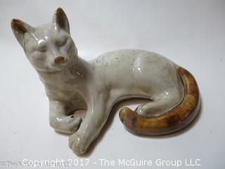 Glazed feline sculpture