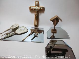 Assortment of crucifixes, mirrored bases, vanity mirror and brush 