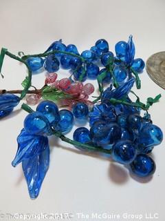 Glass grapes, potted plant and silver toned serving tray  