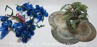 Glass grapes, potted plant and silver toned serving tray  