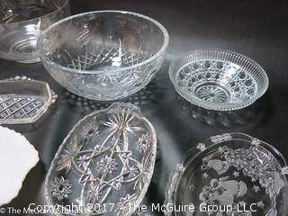 Collection of mostly clear glass serving ware 