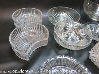 Collection of mostly clear glass serving ware 