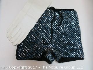 Yes; sequined shorts and long white gloves!