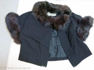 Ladies suit with fur collar