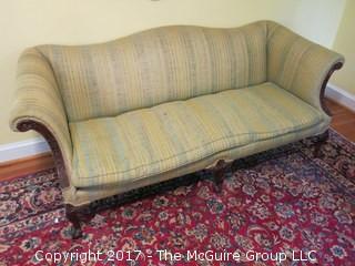 Camelback upholstered sofa; 34" tall at top of back, 80" wide 