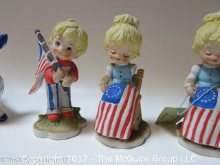 Collection of figurines including those with EU/U.S. flag