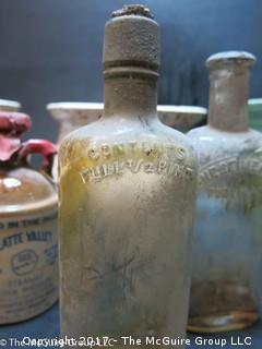 Collection of ceramic pottery including McCoy and vintage glass bottles 