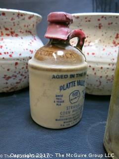 Collection of ceramic pottery including McCoy and vintage glass bottles 