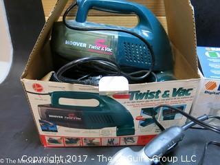 Collection of household appliances including 2 flatirons, hair dryer, knife sharpener, Hoover, Cuisinart chopper and cream whipper 