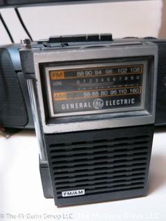 Collection including Emerson boombox, TMK TV, GE transistor radio and Realistic short wave radio 