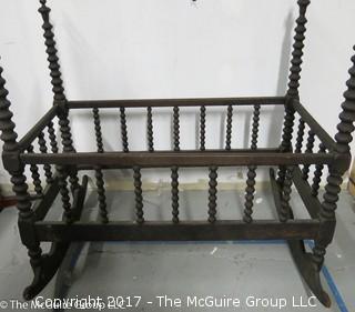 19th c spooled rocking cradle;  41 1/2"W x 22 1/2"L x 23T (corner posts are 40" tall); (Note: one base runner in need of repair)