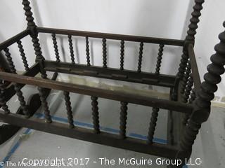 19th c spooled rocking cradle;  41 1/2"W x 22 1/2"L x 23T (corner posts are 40" tall); (Note: one base runner in need of repair)