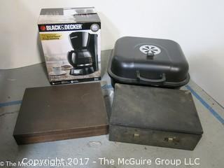 Collection of household items including portabnle grill, Black and Decker coffee pot, vintage display box and cutlery set 