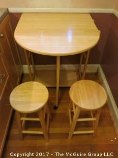 Mobile cart converts to demilune table with pair of bar stools 