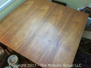 Drop leaf mahogany table: each side 24"; center section 25" W x 48" across