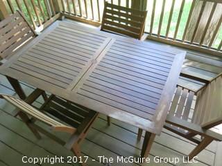 Teak patio table and set of 4 chairs (kept under cover); 38" x 62 x 28" tall  