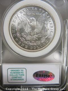 1882 P MORGAN SILVER DOLLAR; SLABBED AND GRADED MS-67 BY NCC 