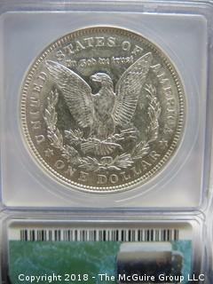 1921 D SILVER DOLLAR; SLABBED AND GRADED AU 58 BY ICG