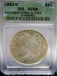 1921 D SILVER DOLLAR; SLABBED AND GRADED AU 58 BY ICG