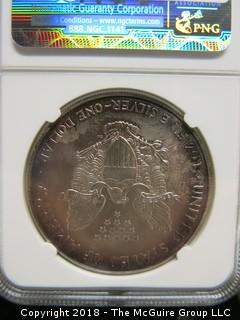 2000 SILVER EAGLE; ARTIFICIAL TONING; SLABBED BY NGC