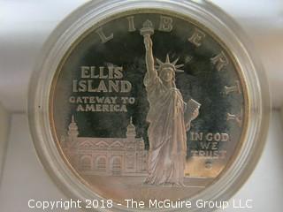 1986 ELLIS ISLAND DOLLAR (NOTE: DESCRIPTION ALTERED 2.10.18)