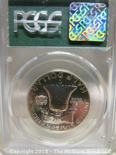 1961 HALF DOLLAR; SLABBED AND GRADED PR 63 BY PCGS