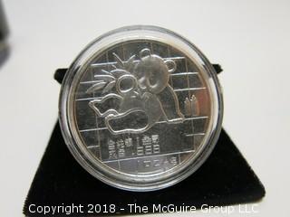 1989 PANDA SILVER 1 TR OZ COIN