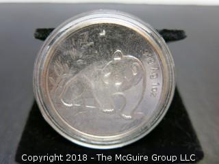 1990 PANDA SILVER 1 TR OZ COIN