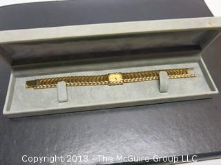 LADIES GOLD TONED BULOVA WATCH