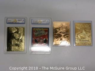 43) 23K GOLD LEAF LIMITED EDITION COLLECTOR CARDS, ENCASED IN PLASTIC;  THE ROCK, TITANIC, BEATLES AND JEFF GORDON