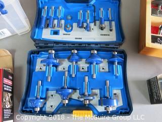 Collection of router bits and accessories