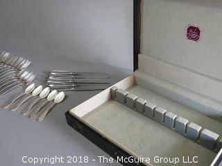 Sterling Flatware and case; 760 grams excluding knives 