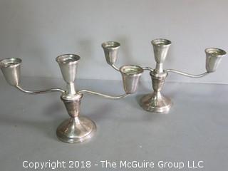 Pair of sterling weighted table candleabras