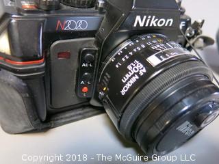 Nikon N2020 AF Camera with AF Nikkor 50mm 1:1.8 and Toshiba 52mmUV lens filter (Description altered 2018-07-12 at 12:50pm.  If you wish to retract a bid, contact me)