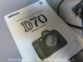 Nikon D-70 with Nikon AF Nikkor 18-35mm lens (Description was altered 2018-07-11 at 12:46pm.  If you wish to retract a bid, contact me).