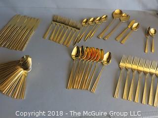 53 pieces of gold toned flatware 