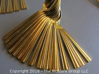 53 pieces of gold toned flatware 