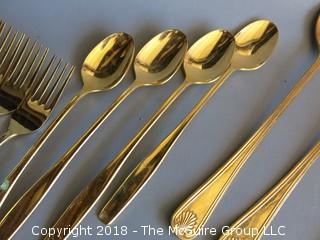 53 pieces of gold toned flatware 