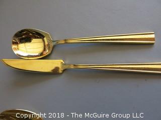 53 pieces of gold toned flatware 