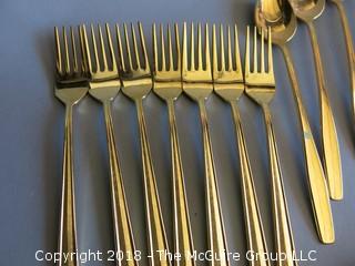 53 pieces of gold toned flatware 