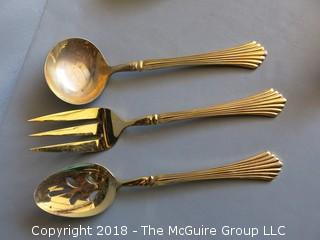 43 pieces of gold toned flatware 