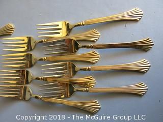 43 pieces of gold toned flatware 