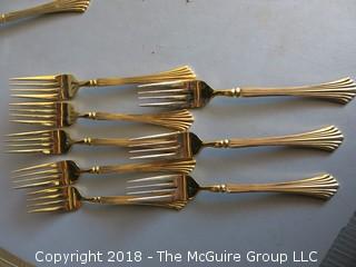 43 pieces of gold toned flatware 